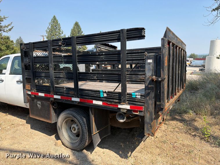 image for item FK4558 2011 Chevrolet Silverado 3500HD Crew Cab flatbed pickup truck