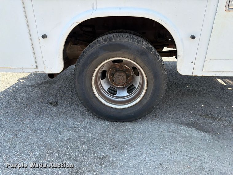 image for item FT6114 2012 Dodge Ram 3500 Crew Cab utility bed pickup truck
