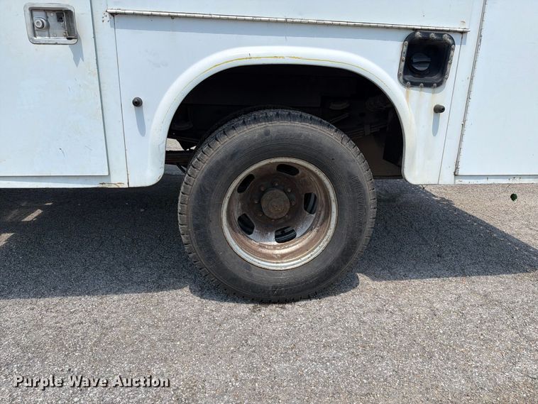 image for item FT6114 2012 Dodge Ram 3500 Crew Cab utility bed pickup truck