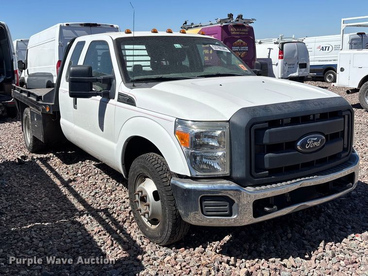 image for item YA3561 2012 Ford F350 Super Duty Ext. Cab flatbed pickup truck