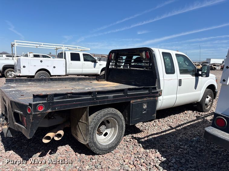 image for item YA3561 2012 Ford F350 Super Duty Ext. Cab flatbed pickup truck