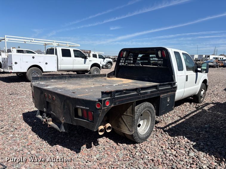 image for item YA3561 2012 Ford F350 Super Duty Ext. Cab flatbed pickup truck