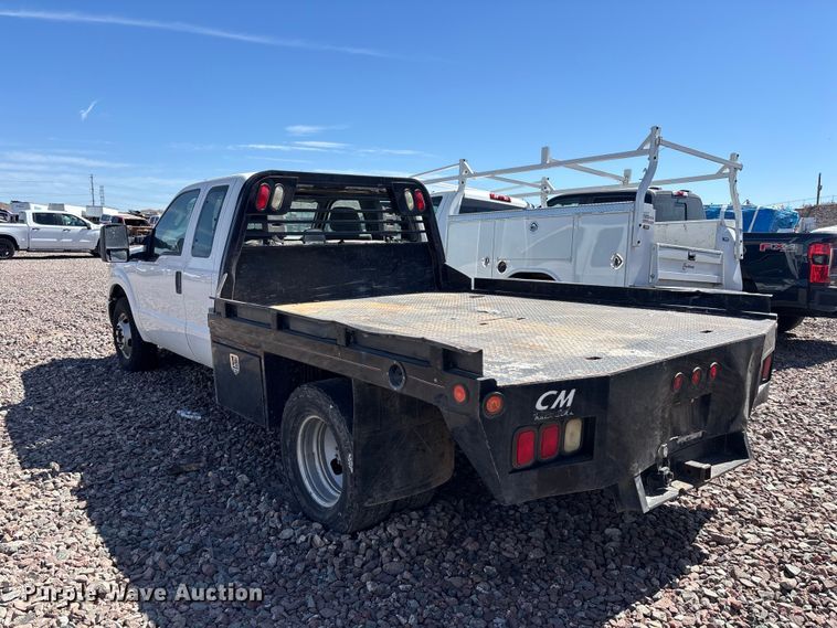 image for item YA3561 2012 Ford F350 Super Duty Ext. Cab flatbed pickup truck
