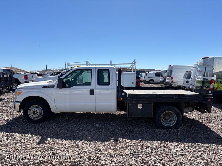 image for item YA3561 2012 Ford F350 Super Duty Ext. Cab flatbed pickup truck