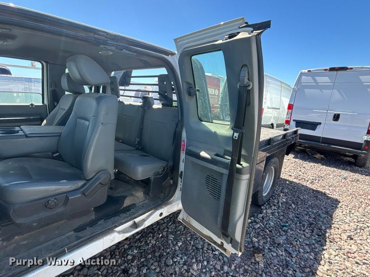 image for item YA3561 2012 Ford F350 Super Duty Ext. Cab flatbed pickup truck