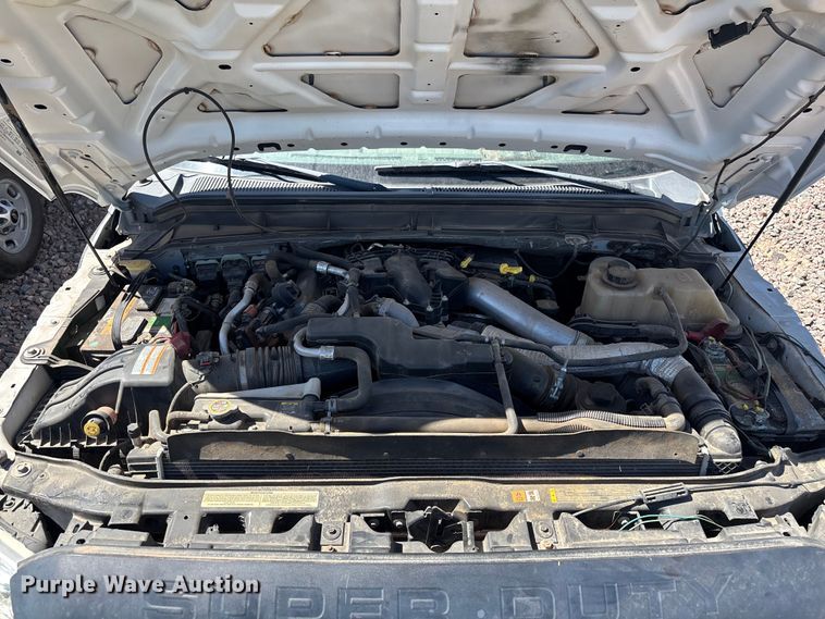 image for item YA3561 2012 Ford F350 Super Duty Ext. Cab flatbed pickup truck