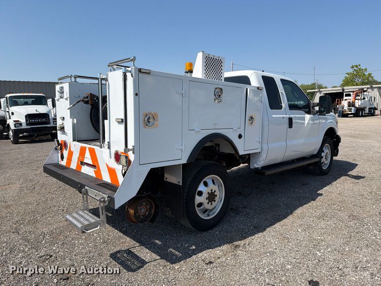 image for item EG9329 2014 Ford F250 Super Duty Ext. Cab utility bed pickup truck