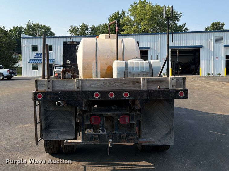 image for item EO8650 2001 Ford F650 Super Duty dump flatbed truck