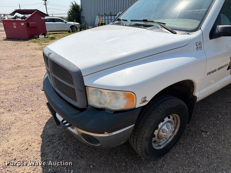 image for item ER1937 2005 Dodge Ram 3500 Ext. Cab utility bed pickup truck