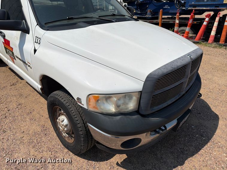 image for item ER1937 2005 Dodge Ram 3500 Ext. Cab utility bed pickup truck