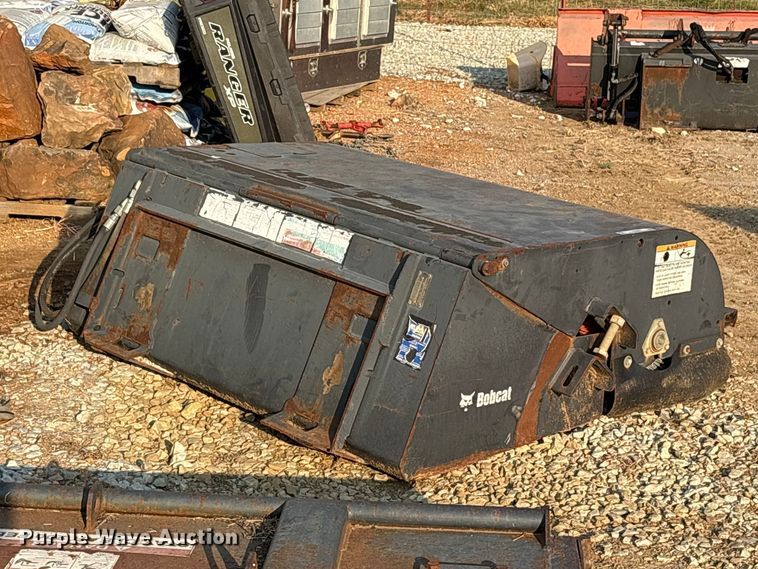 image for item ET0362 2011 Bobcat 60 Sweeper skid steer boom