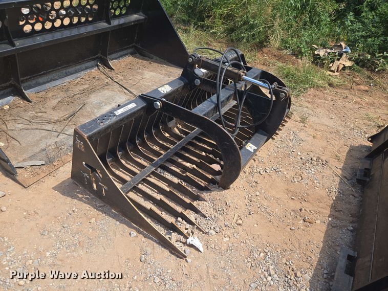 Tomahawk skid steer rock grapple bucket