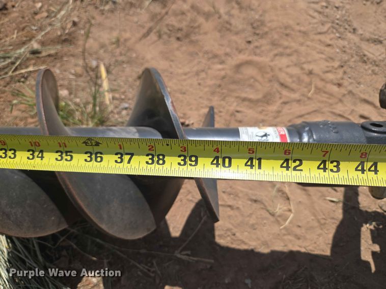 image for item EW8542 Kubota SA20 skid steer auger