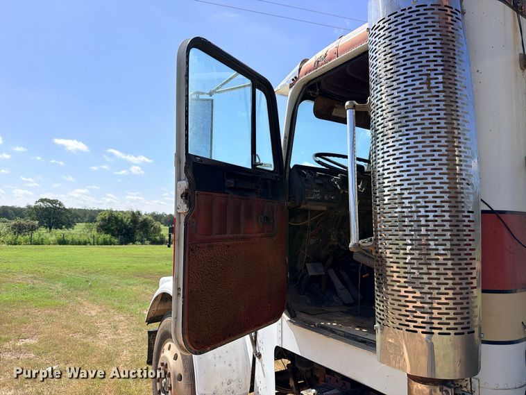 image for item FB8277 1985 Freightliner FLC12054T dump truck