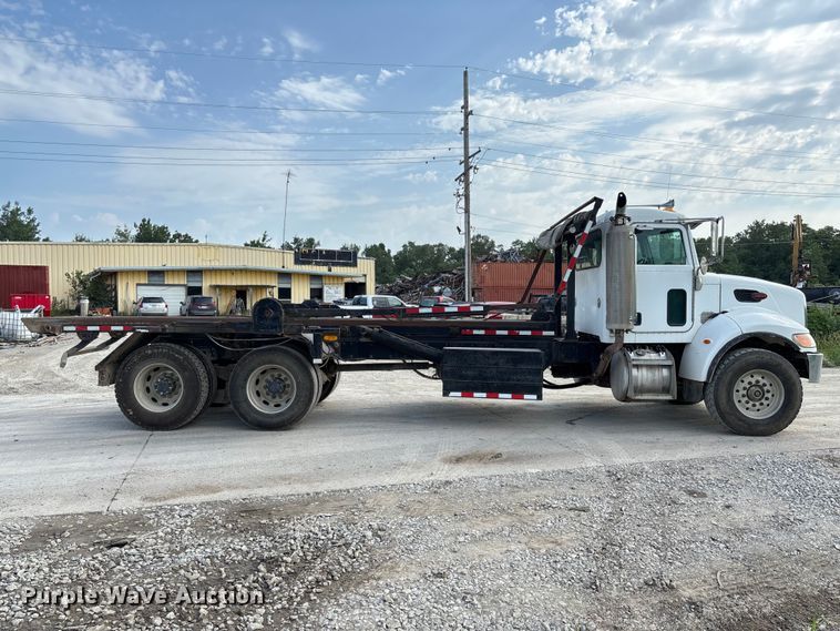 image for item FC1990 2006 Peterbilt 335 rollback truck