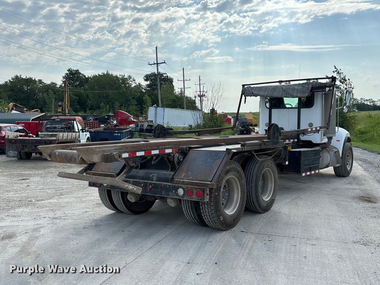 image for item FC1990 2006 Peterbilt 335 rollback truck
