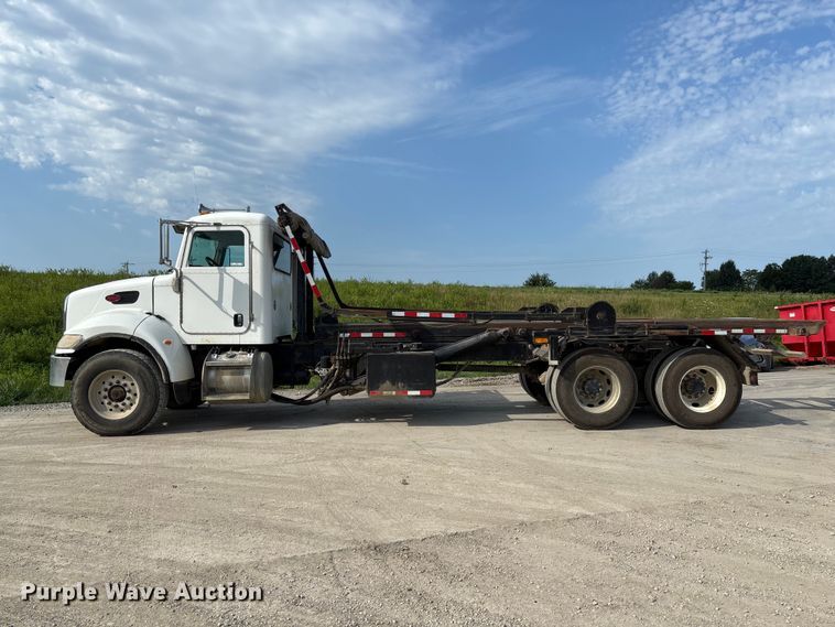image for item FC1990 2006 Peterbilt 335 rollback truck