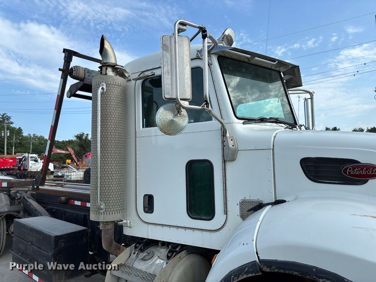 image for item FC1990 2006 Peterbilt 335 rollback truck