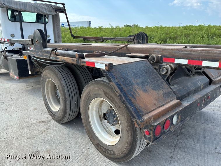 image for item FC1990 2006 Peterbilt 335 rollback truck