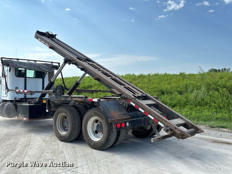 image for item FC1990 2006 Peterbilt 335 rollback truck