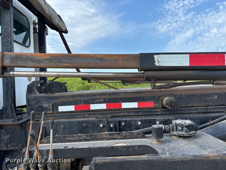 image for item FC1990 2006 Peterbilt 335 rollback truck