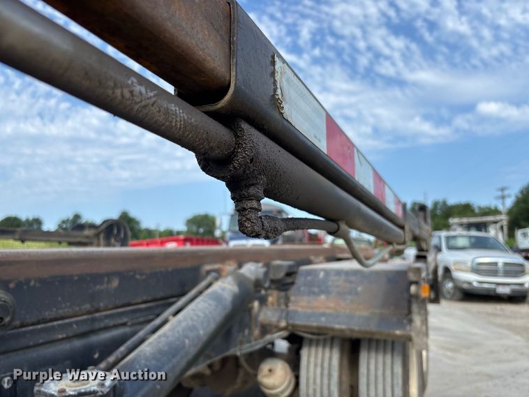 image for item FC1990 2006 Peterbilt 335 rollback truck