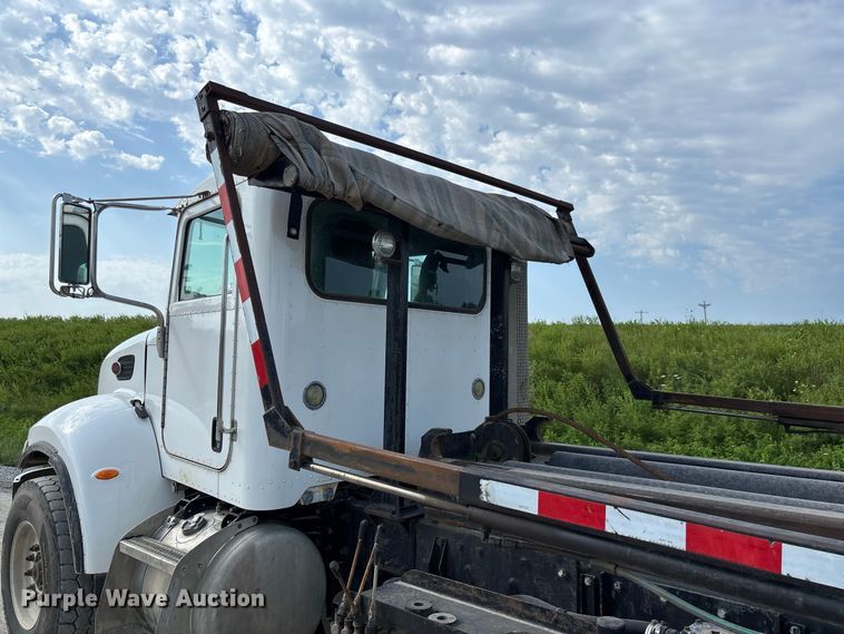 image for item FC1990 2006 Peterbilt 335 rollback truck