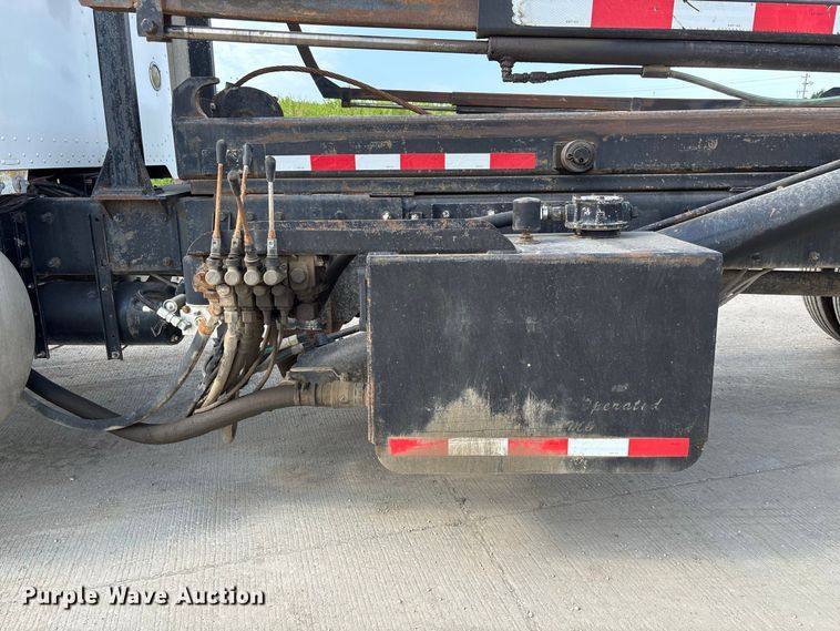image for item FC1990 2006 Peterbilt 335 rollback truck