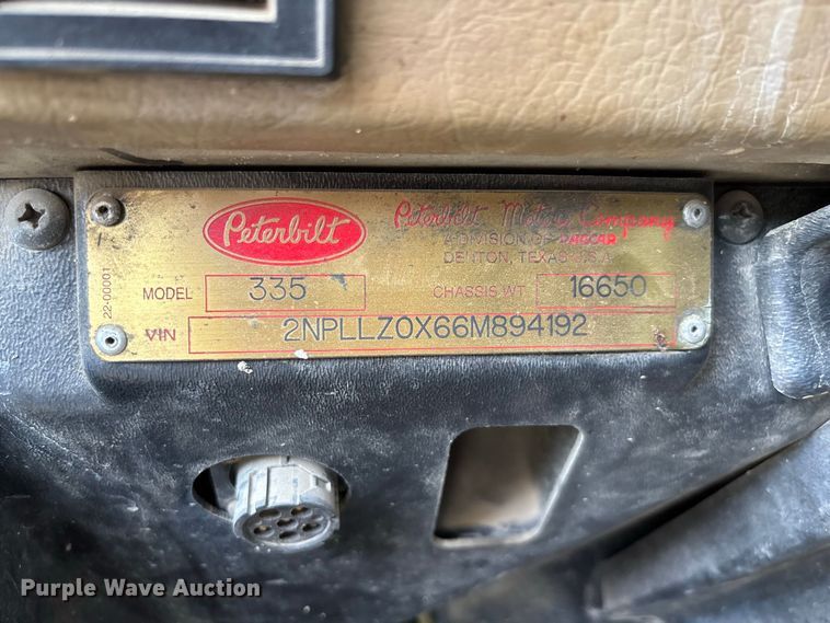image for item FC1990 2006 Peterbilt 335 rollback truck