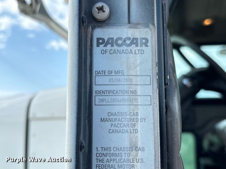image for item FC1990 2006 Peterbilt 335 rollback truck