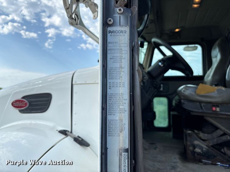 image for item FC1990 2006 Peterbilt 335 rollback truck