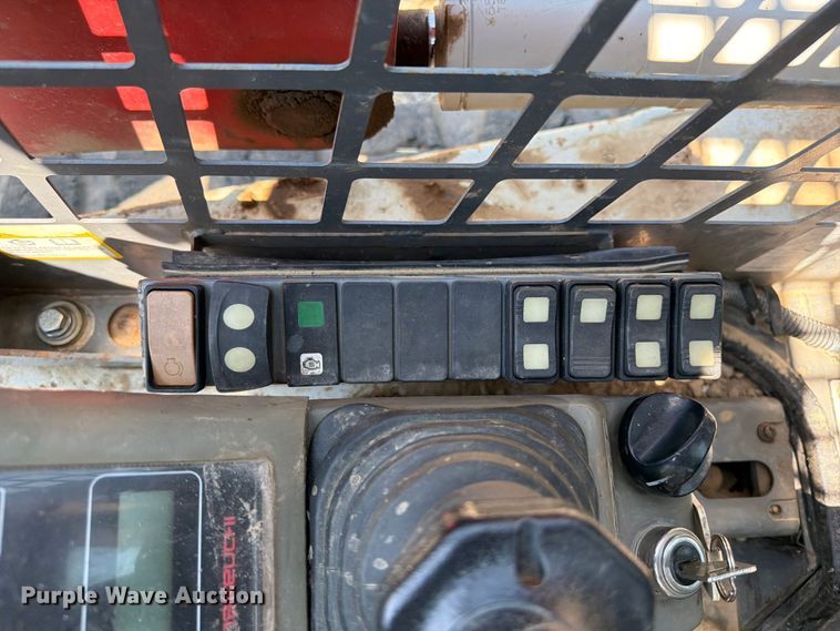 image for item FI0334 2015 Takeuchi TL8 tracked skid steer loader