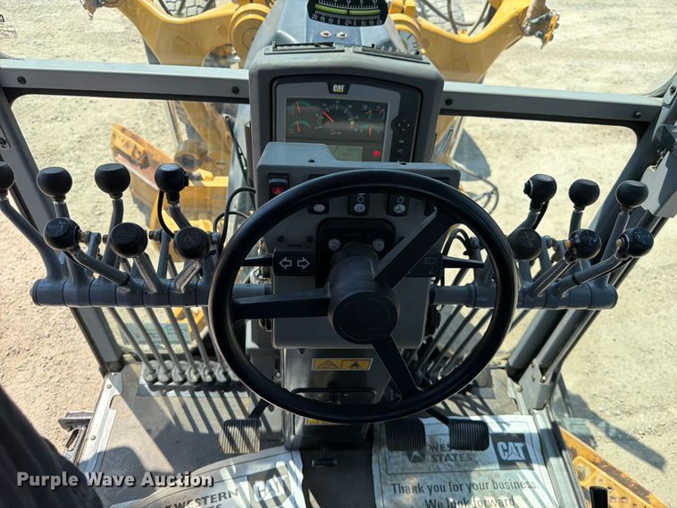 image for item FK4552 2019 Caterpillar 140AWD motor grader