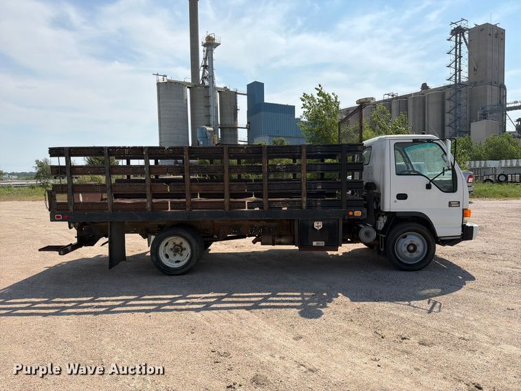 image for item FP3008 2001 GMC W5500 flatbed truck
