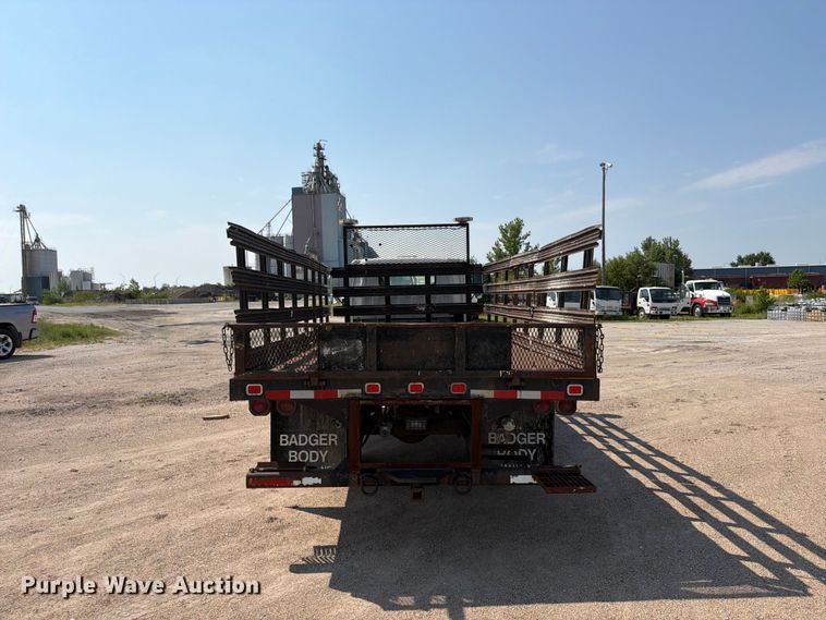image for item FP3008 2001 GMC W5500 flatbed truck