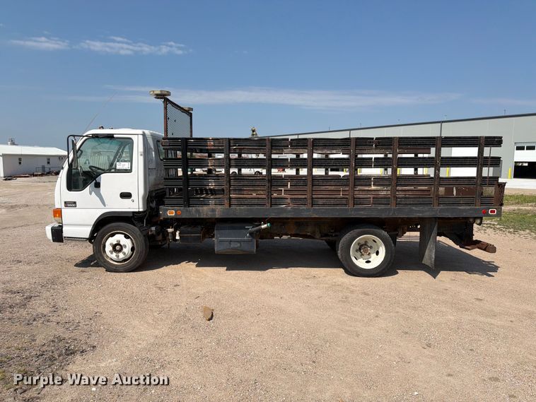 image for item FP3008 2001 GMC W5500 flatbed truck