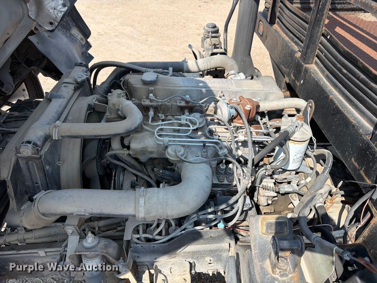 image for item FP3008 2001 GMC W5500 flatbed truck