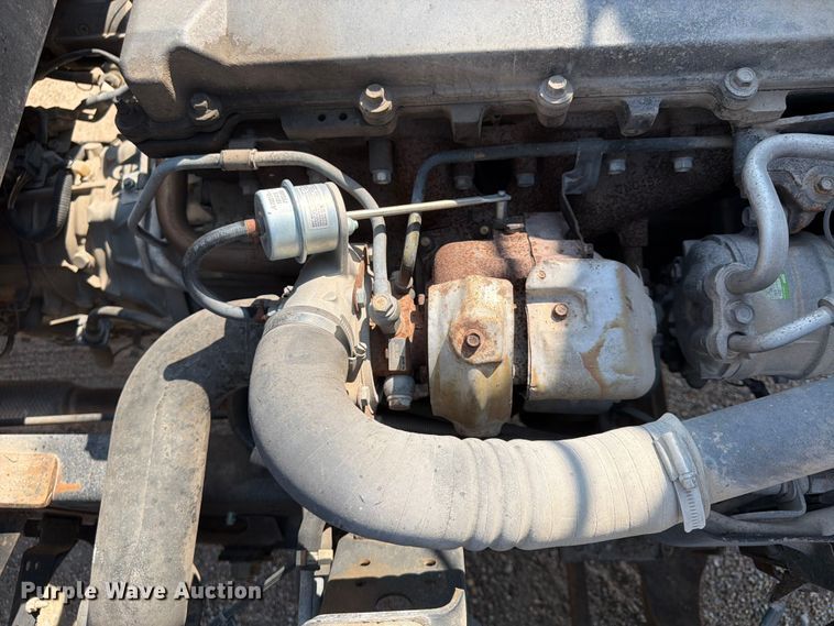 image for item FP3008 2001 GMC W5500 flatbed truck