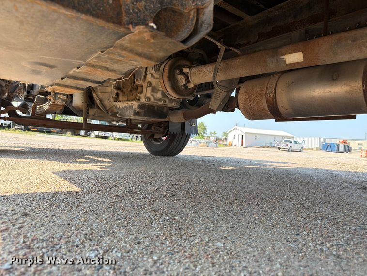 image for item FP3008 2001 GMC W5500 flatbed truck