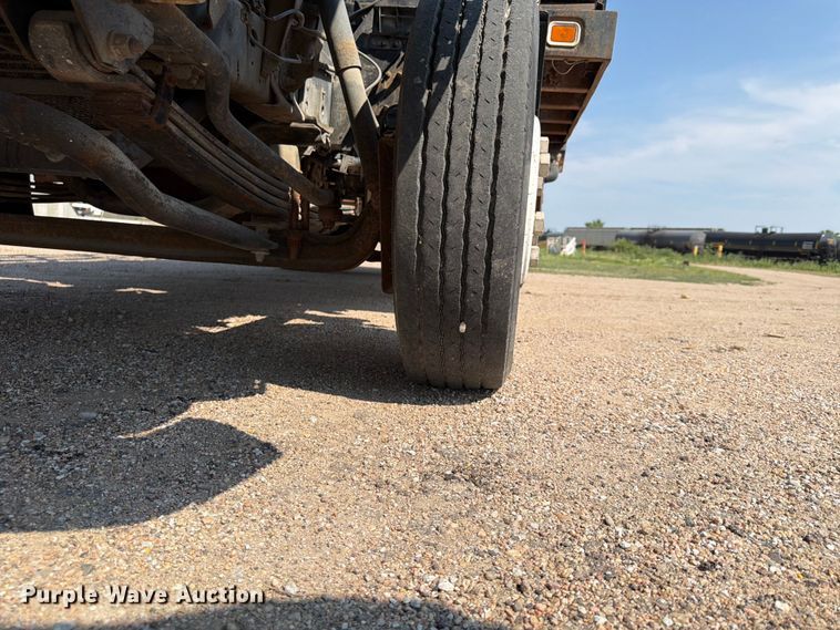 image for item FP3008 2001 GMC W5500 flatbed truck