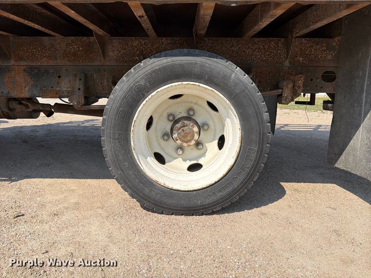 image for item FP3008 2001 GMC W5500 flatbed truck