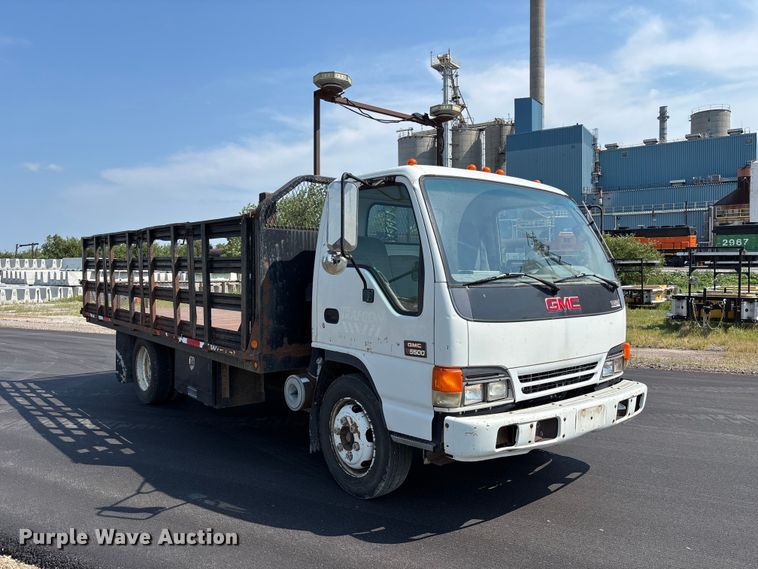 image for item FP3009 2004 GMC W5500 flatbed truck