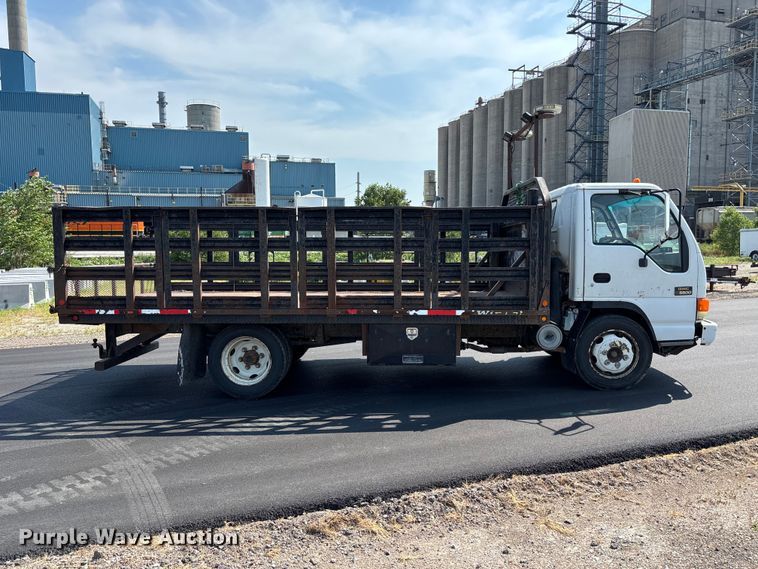 image for item FP3009 2004 GMC W5500 flatbed truck