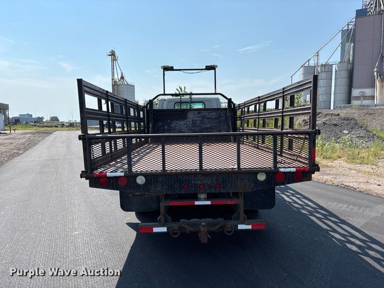 image for item FP3009 2004 GMC W5500 flatbed truck