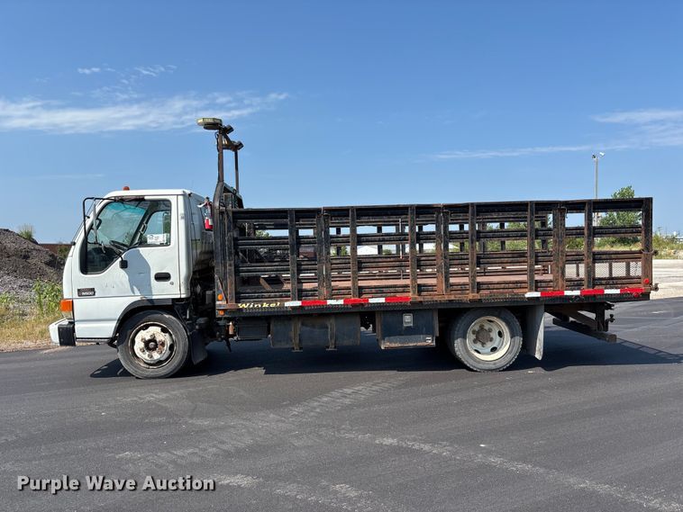 image for item FP3009 2004 GMC W5500 flatbed truck