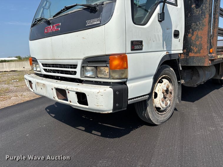 image for item FP3009 2004 GMC W5500 flatbed truck