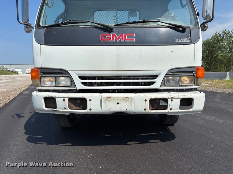 image for item FP3009 2004 GMC W5500 flatbed truck