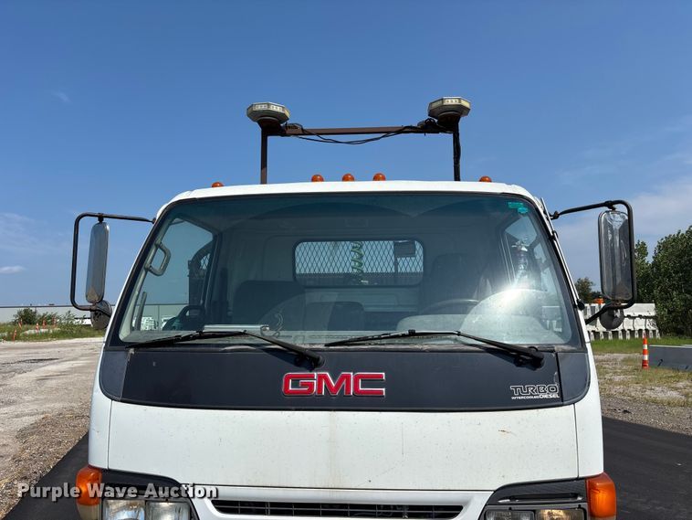 image for item FP3009 2004 GMC W5500 flatbed truck
