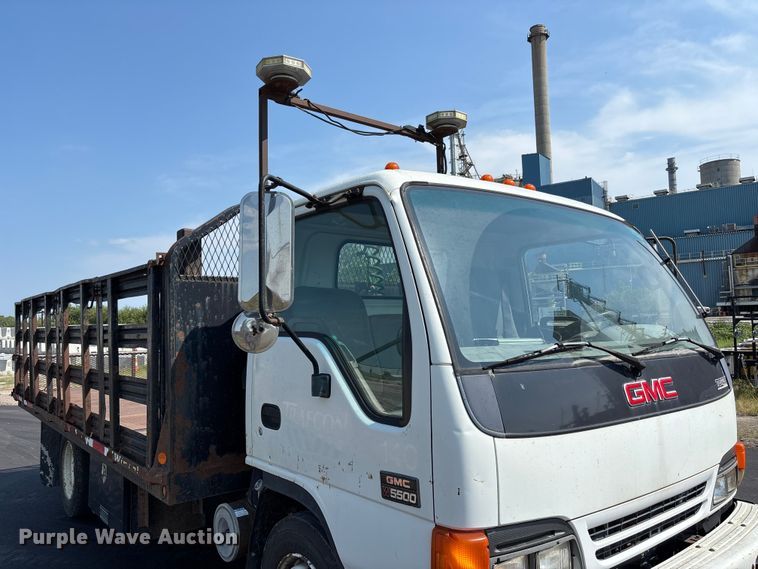 image for item FP3009 2004 GMC W5500 flatbed truck