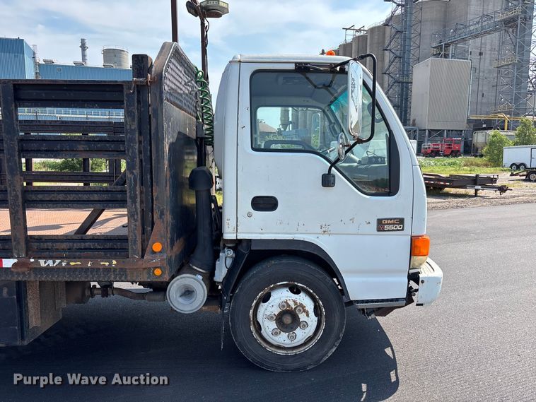 image for item FP3009 2004 GMC W5500 flatbed truck